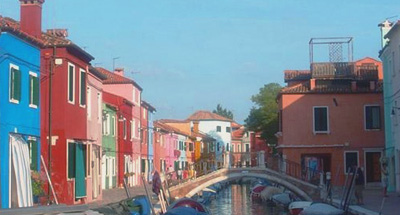 Colourful houses along a canal in Venice