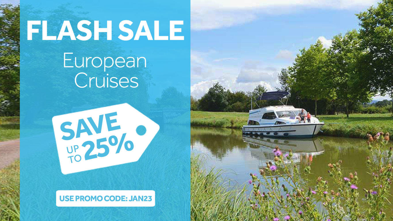 Flash Sale - Save up to 25% on European Cruises offer with image of a boat on a river with green grass and wildflowers in the background